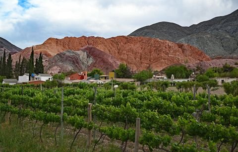The Hill of Seven Colours rising above the village of Purmamarca, Jujuy